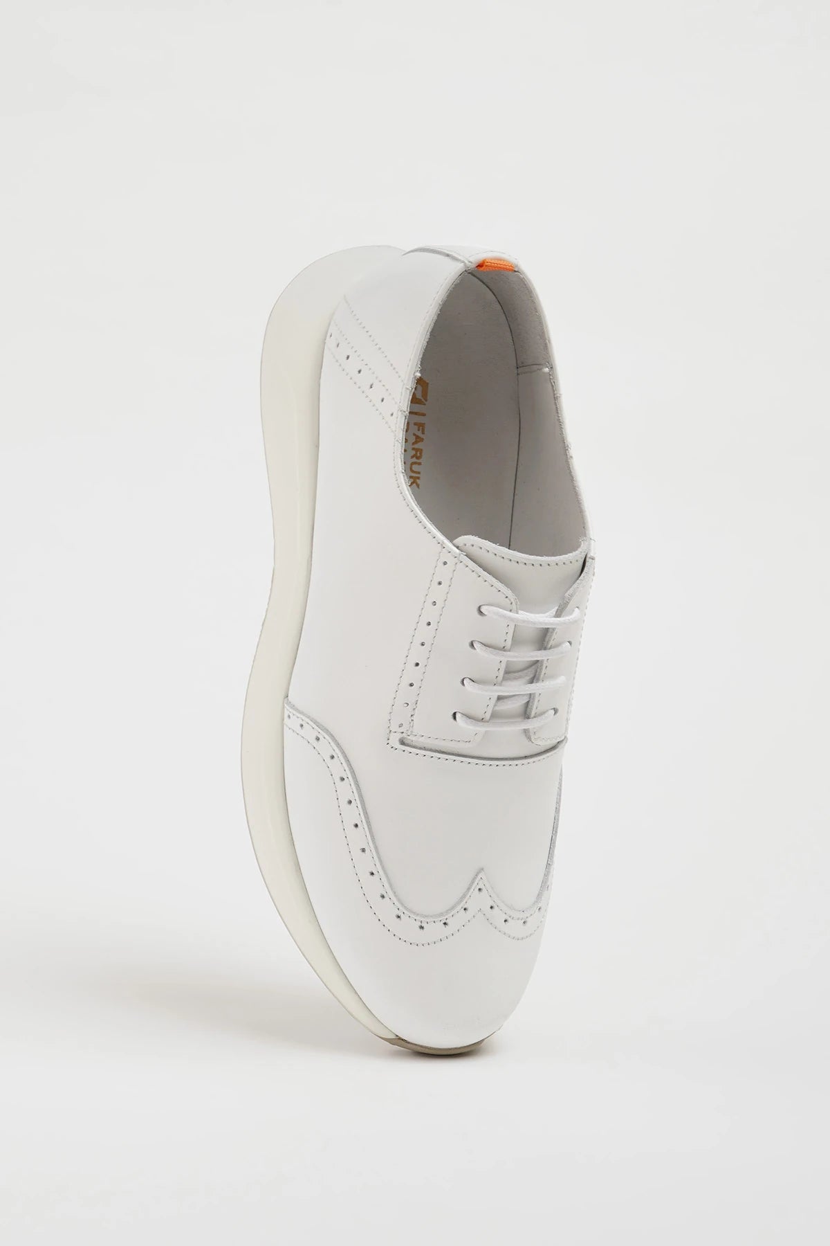All White Wingtip Leather Sneakers