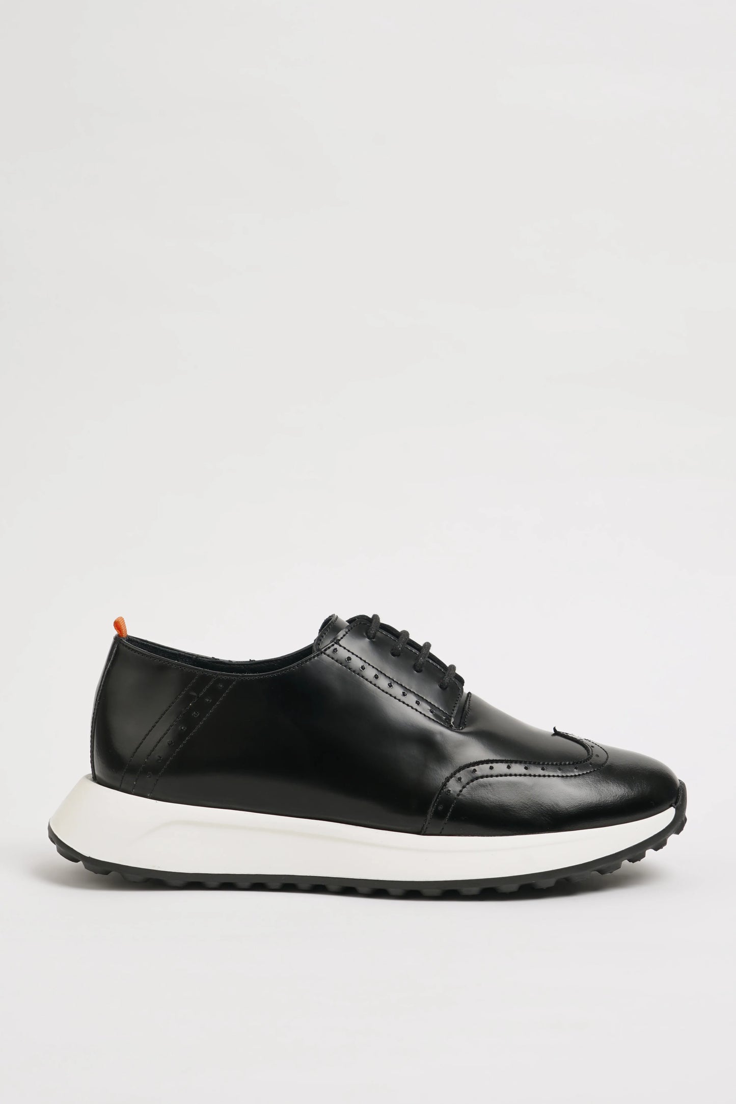 All Black Wingtip Leather Sneakers